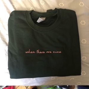 when there are nine embroidered crewneck